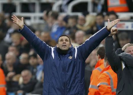 Sunderland manager Gustavo Poyet reacts after Adam Johnson scored a goal against Newcastle during their English Premier League soccer match at St James' Park in Newcastle, northern England December 21, 2014. REUTERS/Andrew Yates