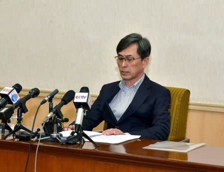 One of the two men whom North Korea identified as being South Korean and accused of being a spy for South Korea attends a news conference in Pyongyang, in this undated photo released by North Korea's Korean Central News Agency (KCNA) in Pyongyang March 26, 2015. REUTERS/KCNA