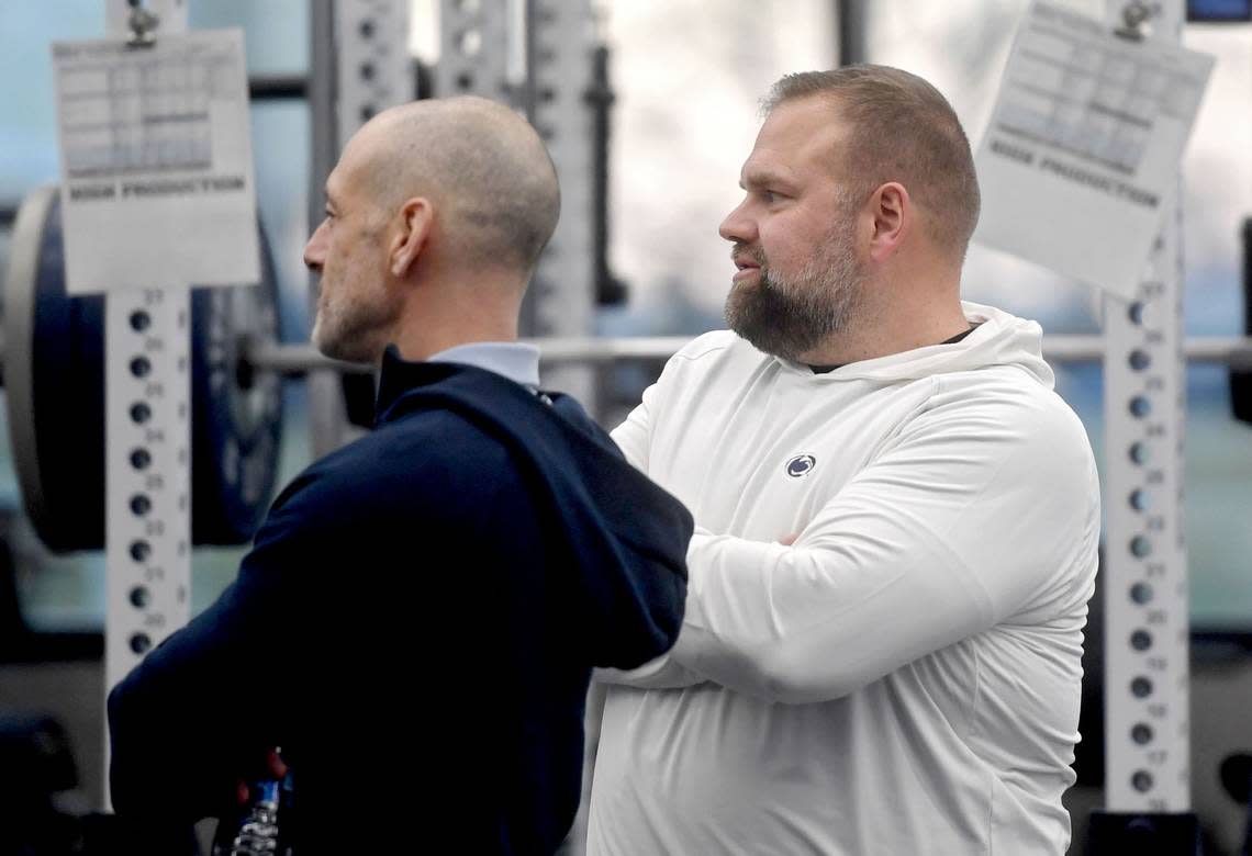 Penn State offensive coordinator Andy Kotelnicki watches players lift during a a winter workout session on Feb. 29.