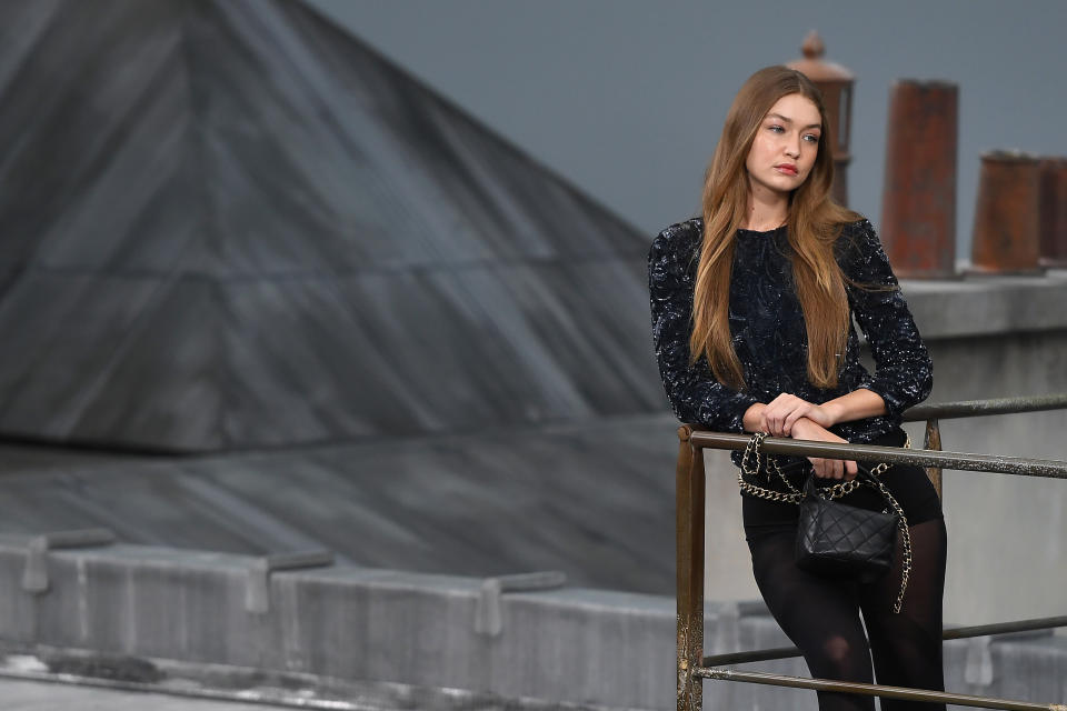 US - Palestinian model Gigi Hadid presents a creation by Chanel during the Women's Spring-Summer 2020 Ready-to-Wear collection fashion show at the Grand Palais in Paris, on October 1, 2019. (Photo by Christophe ARCHAMBAULT / AFP)        (Photo credit should read CHRISTOPHE ARCHAMBAULT/AFP/Getty Images)