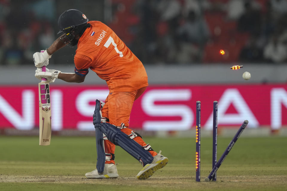 Netherlands' Vikram Singh is bowled by New Zealand's Matt Henry during the ICC Men's Cricket World Cup match between New Zealand and Netherlands in Hyderabad, India, Monday, Oct. 9, 2023. (AP Photo/Mahesh Kumar A.)