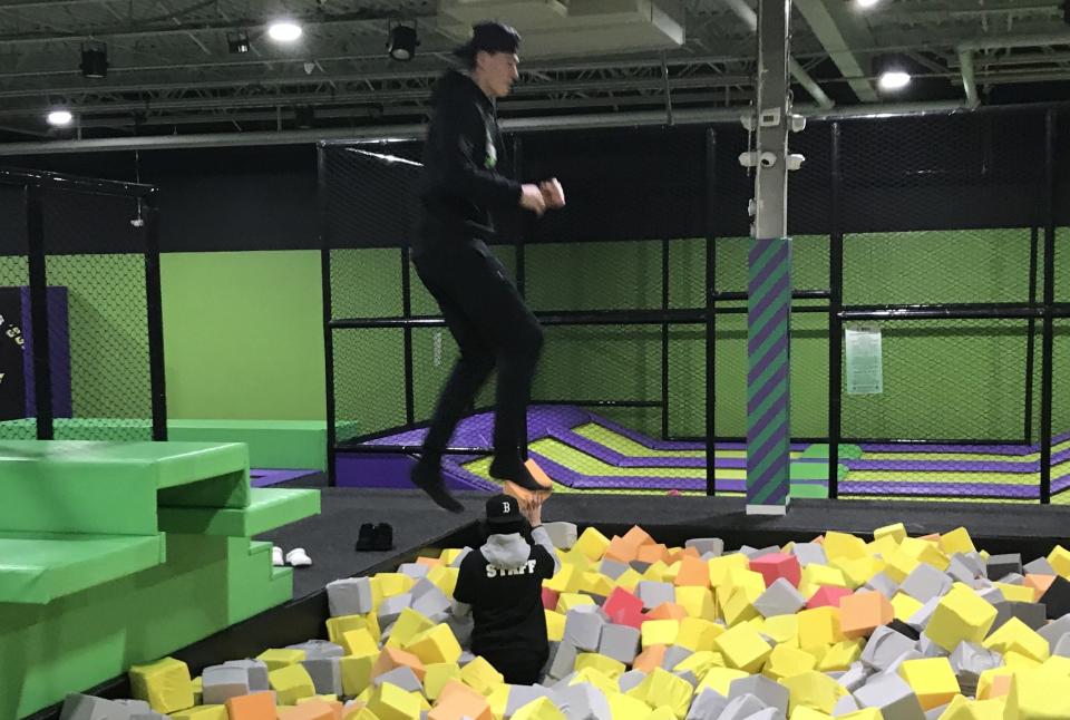 Fun City Adventure Park employee Nick Sabino, a B-P sophomore, demonstrates a jump on Tuesday, Jan. 10, 2023.