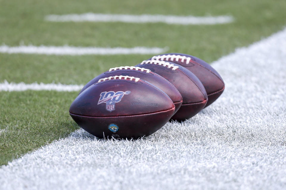 JACKSONVILLE, FL - OCTOBER 13:  Wilson "The Duke" official game day footballs with the NFL 100 years logo is shown during warm-ups before a game between the Jacksonville Jaguars and the New Orleans Saints at TIAA Bank Field on October 13, 2019 in Jacksonville, Florida. The Saints defeated the Jaguars 13-6. (Photo by Don Juan Moore/Getty Images)