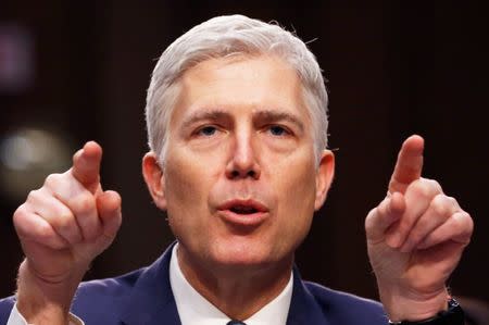 FILE PHOTO -- U.S. Supreme Court nominee judge Neil Gorsuch testifies during a third day of his Senate Judiciary Committee confirmation hearing on Capitol Hill in Washington, U.S., March 22, 2017. REUTERS/Jonathan Ernst/File Photo