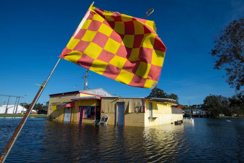 Floodwaters surround buildings in Delcambre, Louisiana, on Saturday.