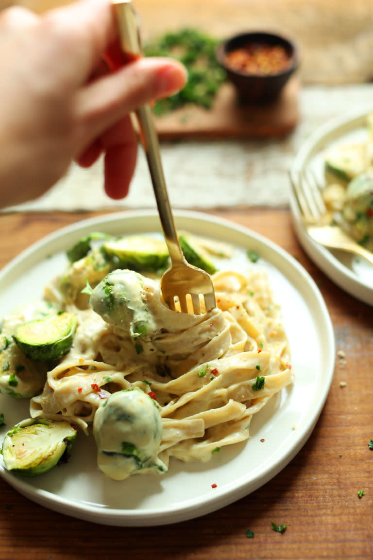 <strong>Get the <a href="https://minimalistbaker.com/vegan-garlic-alfredo-pasta/" target="_blank">Garlic and White Wine Pasta with Brussels Sprouts</a> recipe from Minimalist Baker</strong>