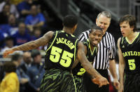 KANSAS CITY, MO - MARCH 09: Brady Heslip #5, A.J. Walton #22 and Pierre Jackson #55 of the Baylor Bears react in the second half against the Kansas Jayhawks during the semifinals of the 2012 Big 12 Men's Basketball Tournament at Sprint Center on March 9, 2012 in Kansas City, Missouri. The Bears defeated the Jayhawks 81 to 72. (Photo by Jamie Squire/Getty Images)