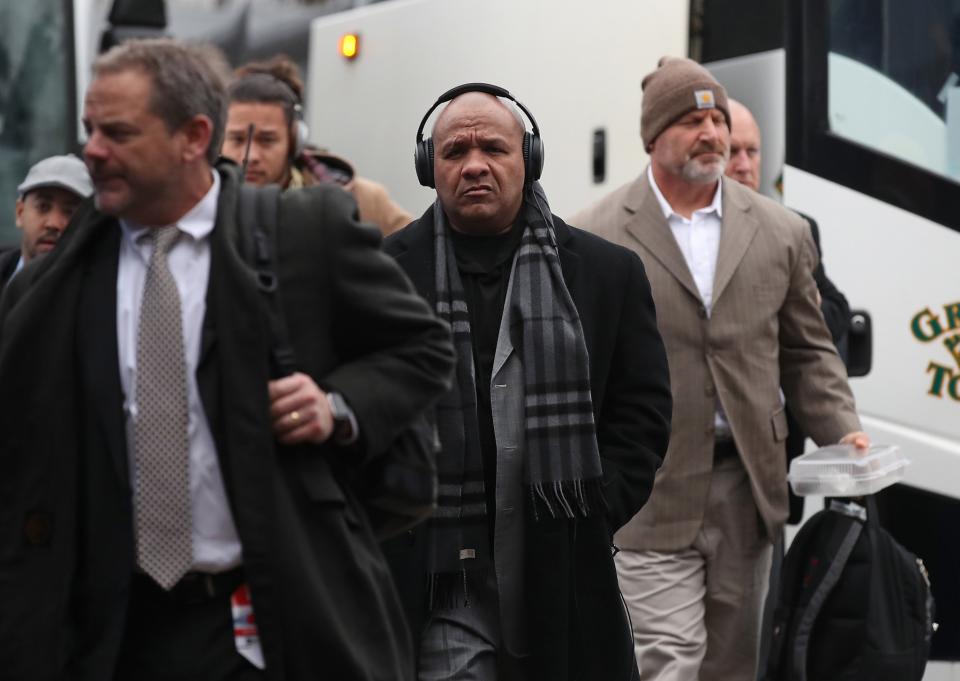 Cleveland Browns staff disembarking buses in Buffalo in December. (Getty Images)