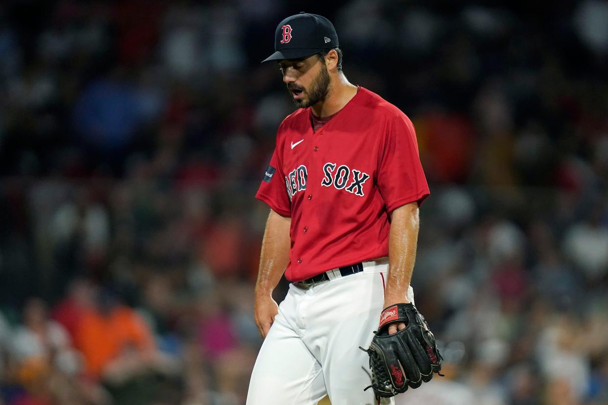 Boston Red Sox's Kyle Barraclough returns to the dugout after giving up runs in the sixth inning of Monday's game against the Houston Astros.