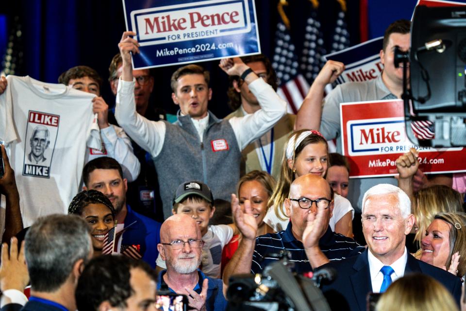 People in the crowd cheer as former Vice President Mike Pence is interviewed on live television during a campaign announcement rally at the FFA Enrichment Center on the DMACC campus on Wednesday, June 7, 2023, in Ankeny.