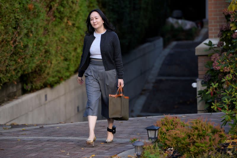 FILE PHOTO: Huawei Technologies Chief Financial Officer Meng Wanzhou leaves her home to attend a court hearing in Vancouver