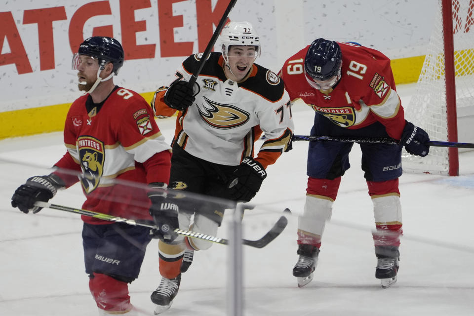 Anaheim Ducks right wing Frank Vatrano (77) celebrates after assisting left wing Alex Killorn with the winning goal during overtime at an NHL hockey game against the Florida Panthers, Monday, Jan. 15, 2024, in Sunrise, Fla. The Ducks defeated the Panthers 5-4. (AP Photo/Marta Lavandier)