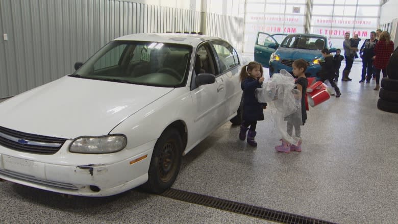 'Truly grateful': Red Deer dealership gives new car to family of girl battling cancer