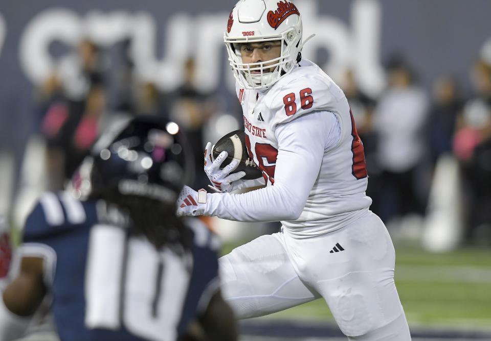 Fresno State tight end Jake Boust (86) catches as pass as Utah State cornerback Jaiden Francois (10) defends during the first half of an NCAA college football game Friday, Oct. 13, 2023, in Logan, Utah. | Eli Lucero/The Herald Journal via AP