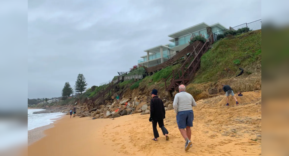 Homes on the edge of a cliff at Wamberal Beach, NSW in 2020 facing coastal erosion. 