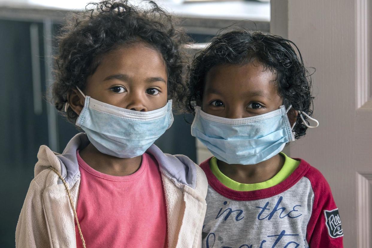 Children wear face masks at a school in Antananarivo, Madagascar: AP