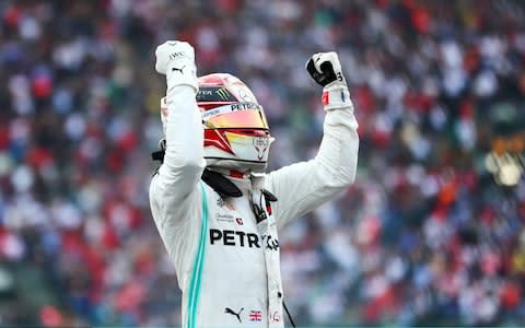 Race winner Lewis Hamilton of Great Britain and Mercedes GP celebrates in parc ferme during the F1 Grand Prix of Mexico at Autodromo Hermanos Rodriguez on October 27, 2019 in Mexico City - Credit: Getty Images