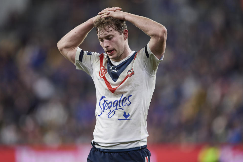 Seen here, Sam Walker reacts with disappointment during an NRL game for the Roosters.