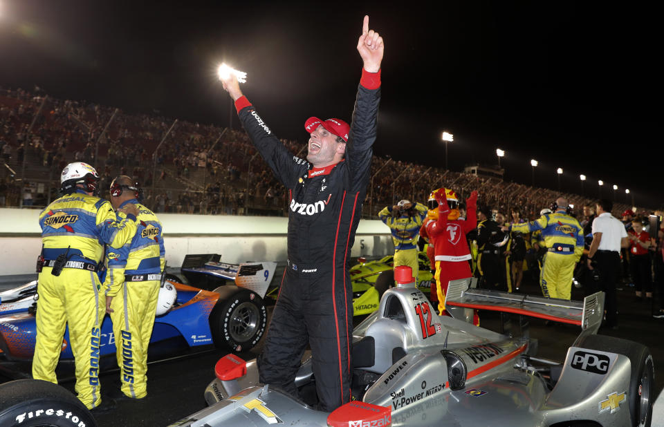 Will Power, of Australia, celebrates after winning the IndyCar auto race at Gateway Motorsports Park on Saturday, Aug. 25, 2018, in Madison, Ill. (AP Photo/Jeff Roberson)