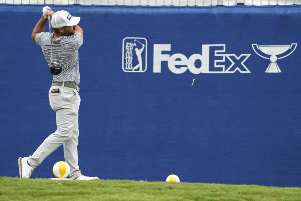 Stephan Jaeger, of Germany, tees off on the 10th hole during the first round of the Wyndham Championship golf tournament in Greensboro, N.C., Thursday, Aug. 3, 2023. (AP Photo/Chuck Burton)