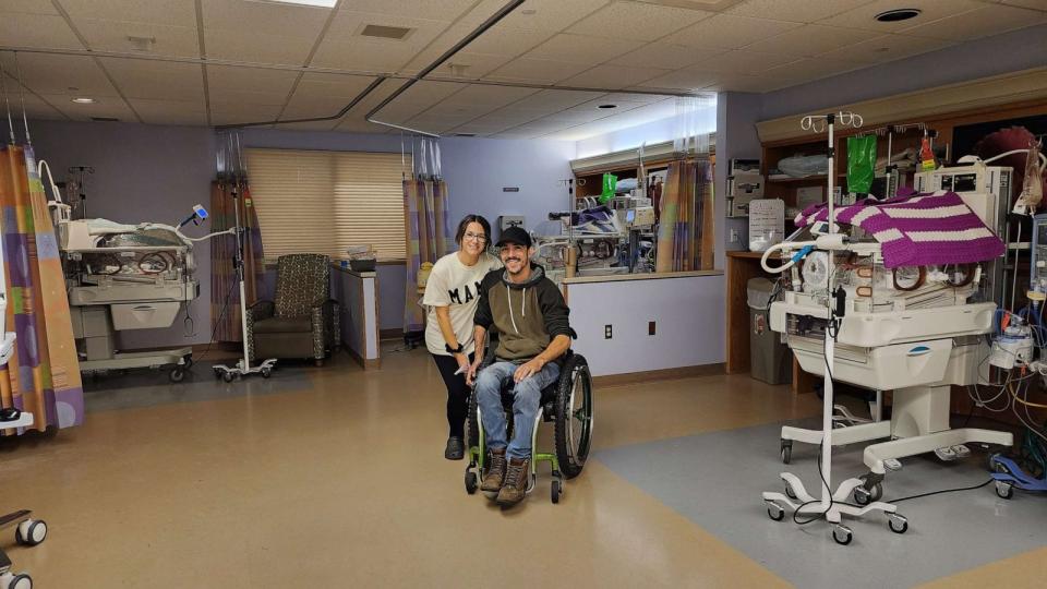 PHOTO: Zac and Brittney Wolfe pose in the neo-natal intensive care unit with their triplet newborns, Knox, Noah and Navie. (Zac and Brittney Wolfe)