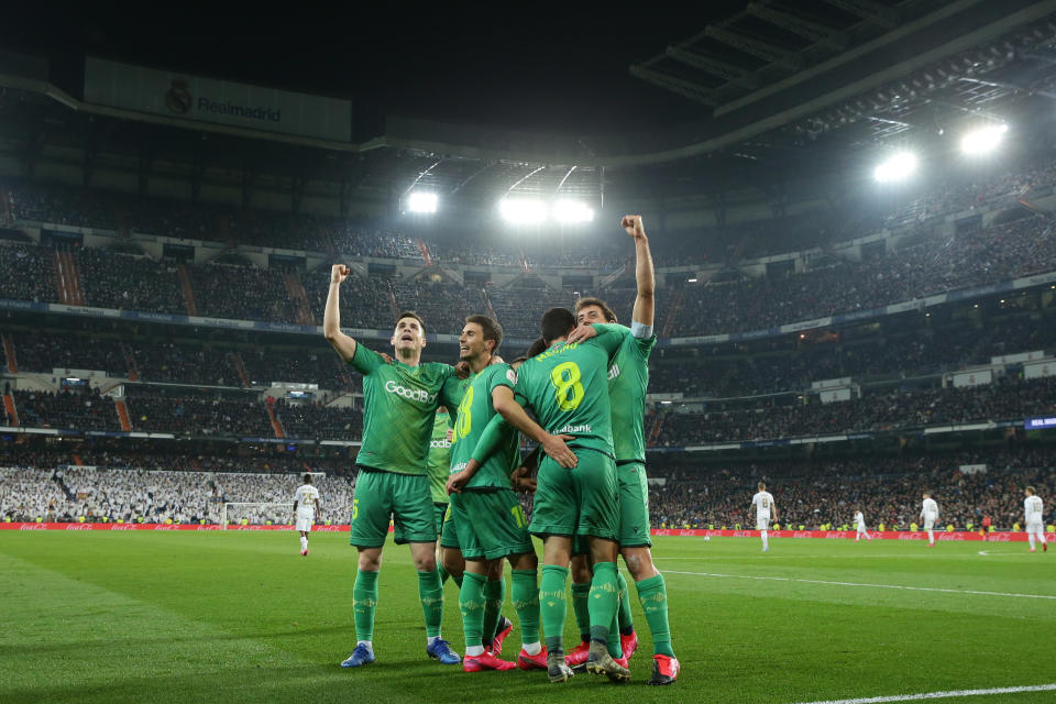 MADRID, SPAIN - FEBRUARY 06: Mikel Merino (2ndR) celebrates after scoring their fourth goal with teammates Igor Zubeldia (L), Andoni Gorosabel (3dL) and Mikel Oyarzabal (R) during the Copa del Rey quarter final match between Real Madrid and Real Sociedad de Futbol at Estadio Santiago Bernabeu on February 06, 2020 in Madrid, Spain. (Photo by Gonzalo Arroyo Moreno/Getty Images)