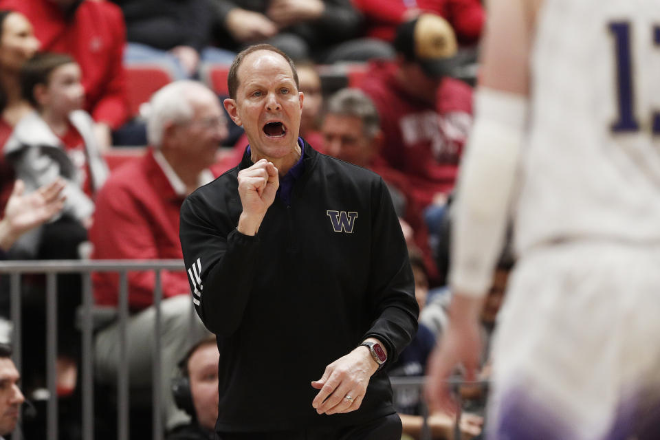 Washington head coach Mike Hopkins directs his team during the first half of an NCAA college basketball game against Washington State, Thursday, March 7, 2024, in Pullman, Wash. (AP Photo/Young Kwak)