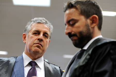 Prosecutor Antonino Di Matteo waits for the reading of the sentence, at the end of a historic mafia case in which mob bosses and former high-ranking state officials were convicted of holding secret negotiations in the early 1990s, in Palermo, Italy April 20, 2018. REUTERS/Guglielmo Mangiapane