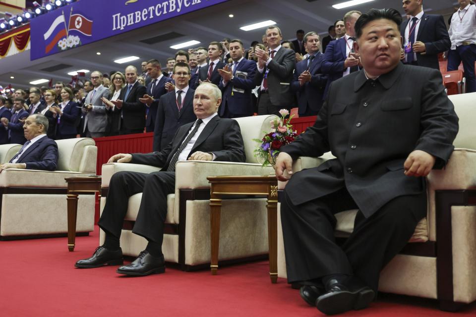 Russian President Vladimir Putin, center, North Korea's leader Kim Jong Un, right, and Russian Foreign Minister Sergey Lavrov, left, attend a gala concert in Pyongyang, North Korea, on Wednesday, June 19, 2024. (Gavriil Grigorov, Sputnik, Kremlin Pool Photo via AP)