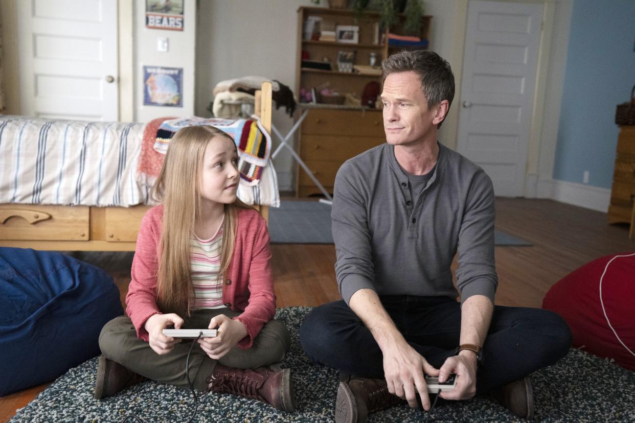 Sophia Reid-Gantzert and Neil Patrick Harris in 8-Bit Christmas. (Photo: Sabrina Lantos/© Warner Bros./`Courtesy Everett Collection