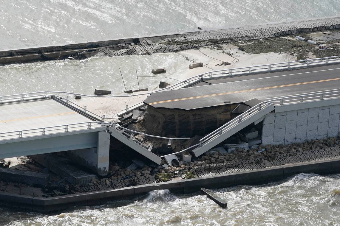 A section of the damaged Sanibel Causeway seen in the aftermath of Hurricane Ian, Thursday, Sept. 29, 2022, near Sanibel Island, Fla. (AP Photo/Wilfredo Lee)