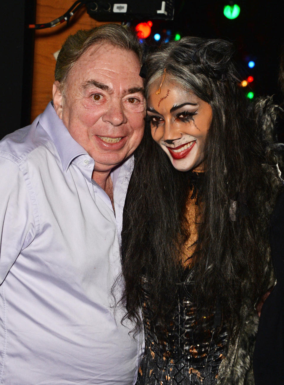 LONDON, ENGLAND - DECEMBER 11:  Lord Andrew Lloyd Webber (L) and Nicole Scherzinger pose backstage following the press night performance of "Cats" as Nicole Scherzinger joins the cast at the London Palladium on December 11, 2014 in London, England.  (Photo by David M. Benett/Getty Images)