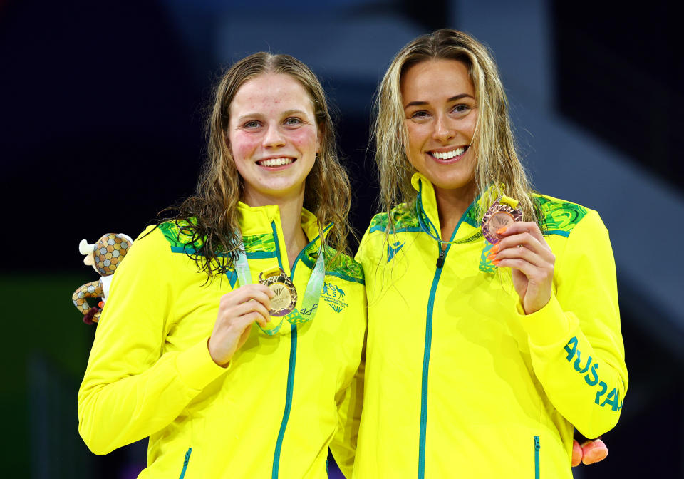 Elizabeth Dekkers and Brianna Throssell, pictured here after the 200m butterfly final at the Commonwealth Games.