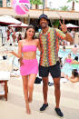 <p>Rachael Kirkconnell and Matt James kick back at the Evian Sparkling Water launch party at Tao Beach Club at the Venetian Hotel in Las Vegas on July 14. </p>