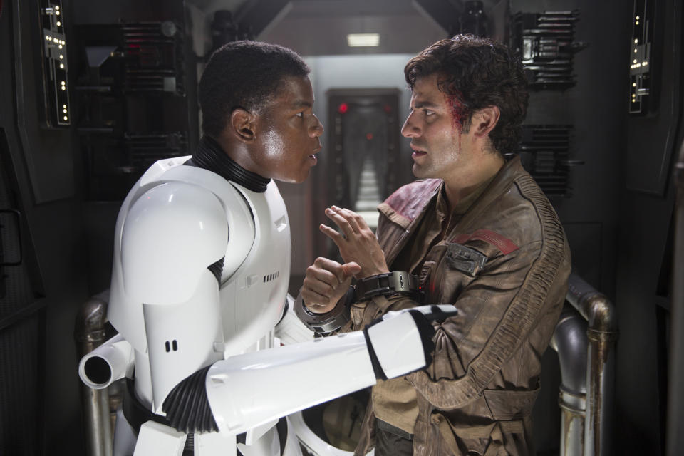 Finn (John Boyega) and Poe Dameron (Oscar Isaac) in <em>The Force Awakens</em> (Photo: Lucasfilm)