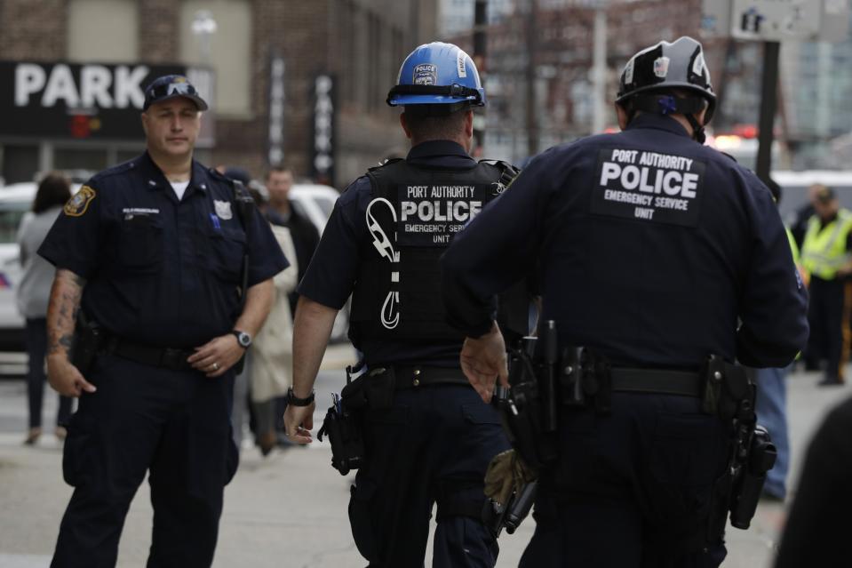 <p>Emergency officials walk toward the Hoboken Terminal following a train crash, Thursday, Sept. 29, 2016, in Hoboken, N.J. (AP Photo/Julio Cortez) </p>