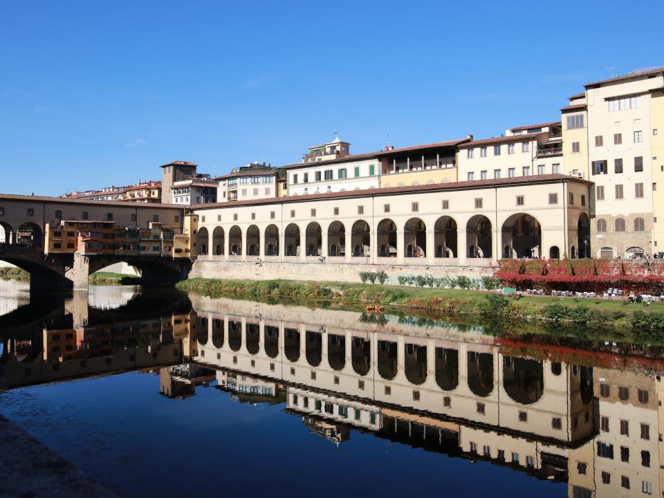 shot of the Vasari Corridor and neighboring bridge over river