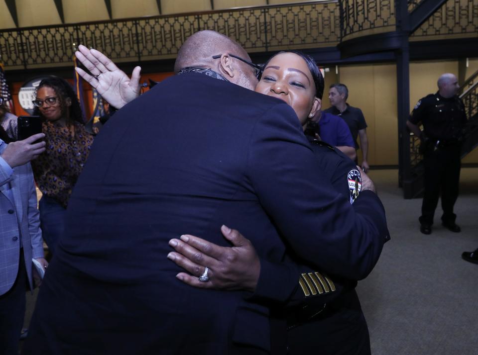 Interim Louisville Police Chief Jacquelyn Gwinn-Villaroel, right, hugged retired LMPD officer Steven M. Kelsey after she was announced as the permanent chief of the LMPD following a nationwide search in Louisville, Ky. on July 20, 2023.
