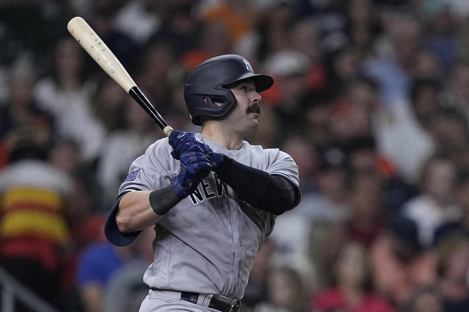 New York Yankees' Austin Wells watches his RBI sacrifice fly during the fifth inning of the team's baseball game against the Houston Astros, Saturday, Sept. 2, 2023, in Houston. (AP Photo/Kevin M. Cox)