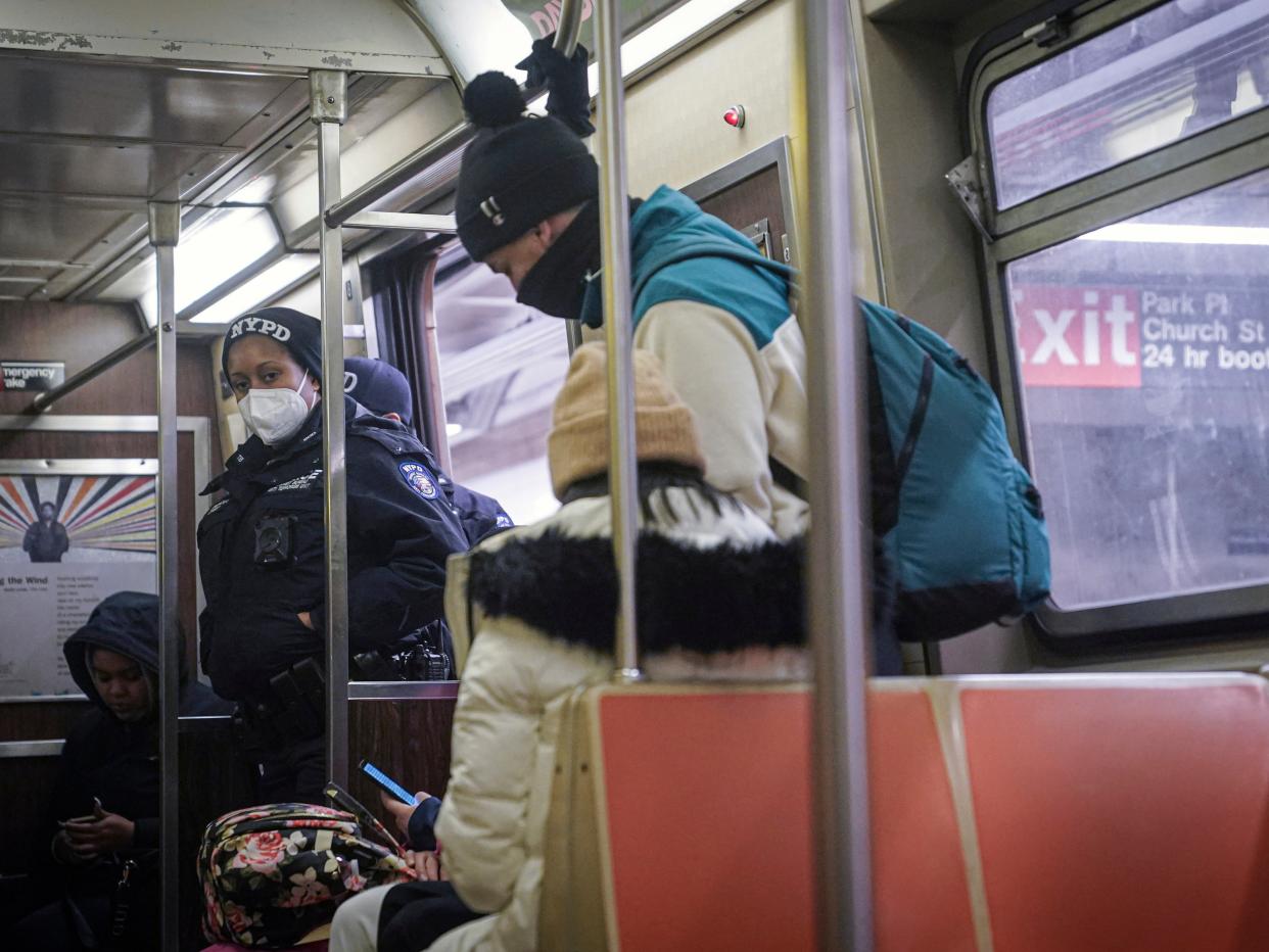 <p>Police patrol the A line subway train bound to Inwood, after NYPD deployed an additional 500 officers into the subway system following deadly attacks, Saturday 13 February 2021</p> ((Associated Press))