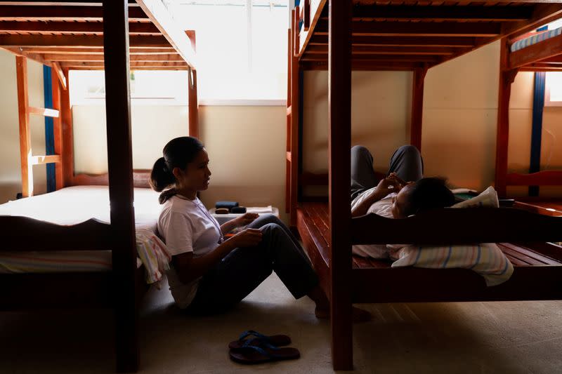 Drug rehab patients chat at the female dormitory of the Mega Drug Abuse Treatment and Rehabilitation Center, in Nueva Ecija province