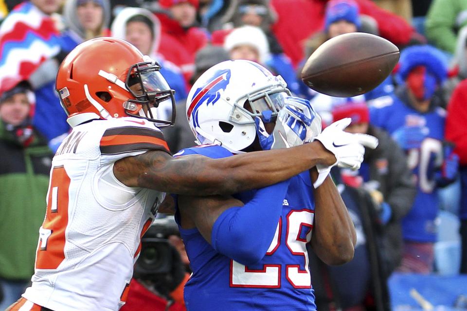 <p>Buffalo Bills cornerback Kevon Seymour, right, breaks up a pass intended for Cleveland Browns wide receiver Corey Coleman during the first half of an NFL football game, Sunday, Dec. 18, 2016, in Orchard Park, N.Y. (AP Photo/Bill Wippert) </p>