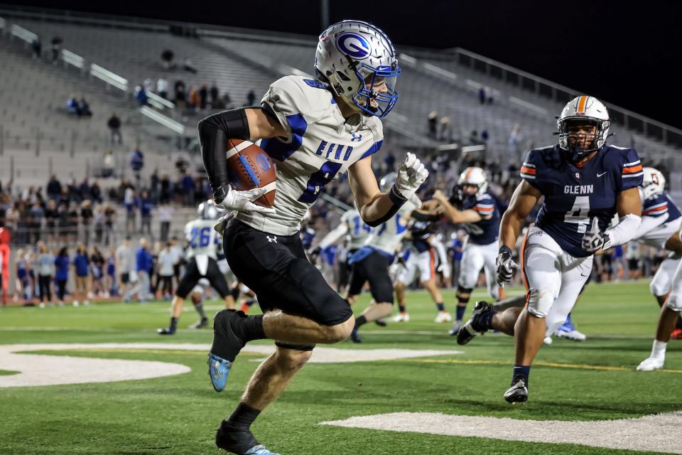 Georgetown receiver Drayden Dickman, racing away from Glenn during a 28-22 Eagles win last fall, will join the Rice football team this fall.