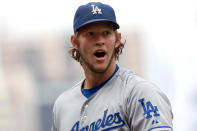 SAN DIEGO, CA - SEPTEMBER 25: Clayton Kershaw #22 of the Los Angeles Dodgers walks off the mound during the 7th inning on his way recording his 21st win of the season during the game against the San Diego Padres at Petco Park on September 25, 2011 in San Diego, California. (Photo by Kent C. Horner/Getty Images)