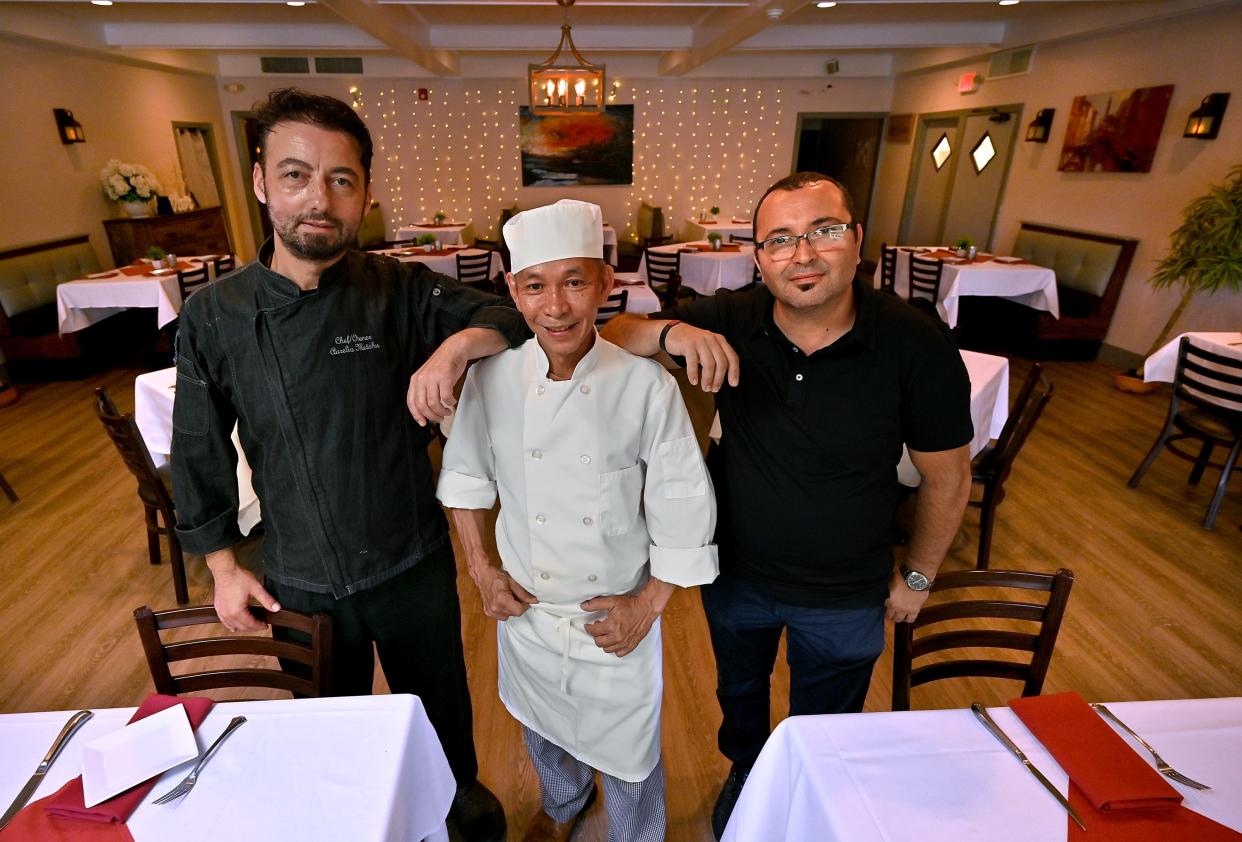 Sushi chef Kenzo Phan, center, Casta Diva owner Aurelio Metohu left, and general manager Alban Metohu.