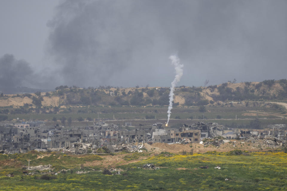 An Israeli army flare is seen over the Gaza Strip, as seen from southern Israel, Monday, March 18, 2024. (AP Photo/Ohad Zwigenberg)