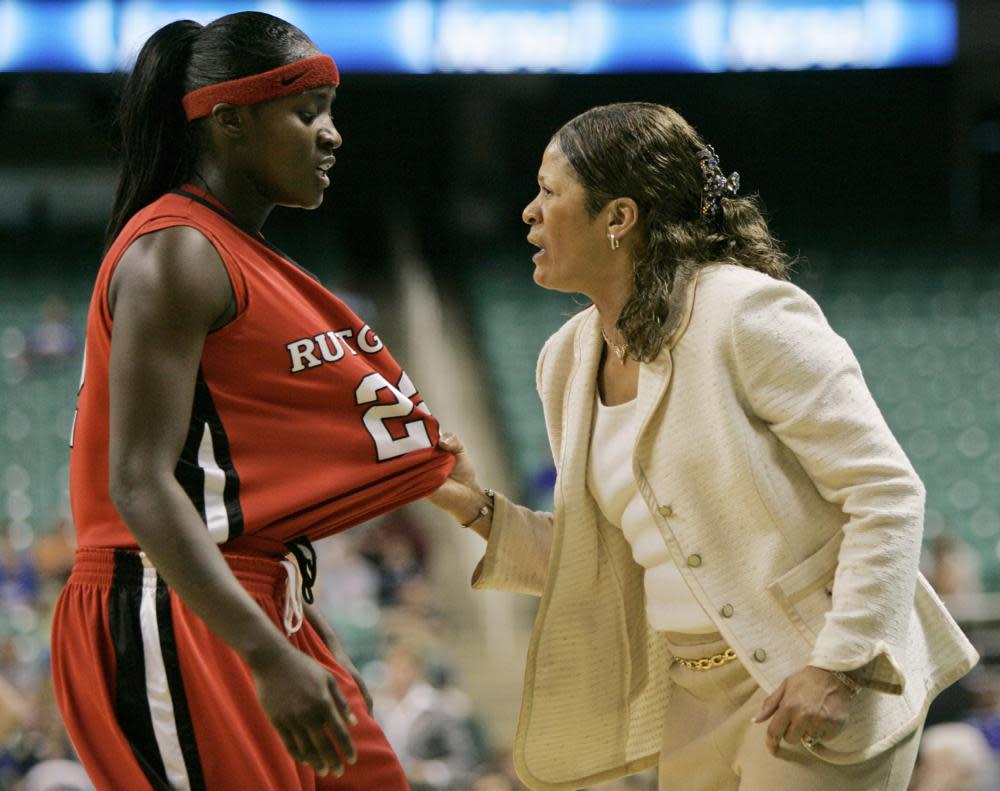 Rutgers coach C. Vivian Stringer gives instructions to Matee Ajavon in the second half of a regional semifinal of the NCAA women’s basketball tournament in Greensboro, N.C., Saturday, March 24, 2007. (AP Photo/Mary Ann Chastain, File)