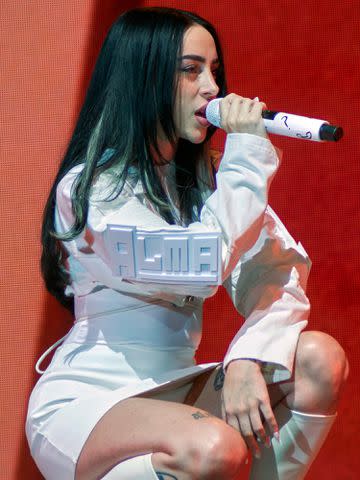 <p>Jaime Nogales/Medios y Media/Getty</p> Nicki Nicole performs during a concert at Pepsi Center WTC in November 2023 in Mexico City