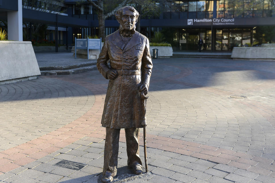 This image provided by Hamilton City Council, shows the bronze statue of British Captain John Fane Charles Hamilton before it was removed from a square in central Hamilton, New Zealand, Friday, June 12, 2020. The New Zealand city of Hamilton on Friday removed the bronze statue of the British naval officer the city is named after a man who is accused of killing indigenous Maori people in the 1860s. (Hamilton City Council via AP)