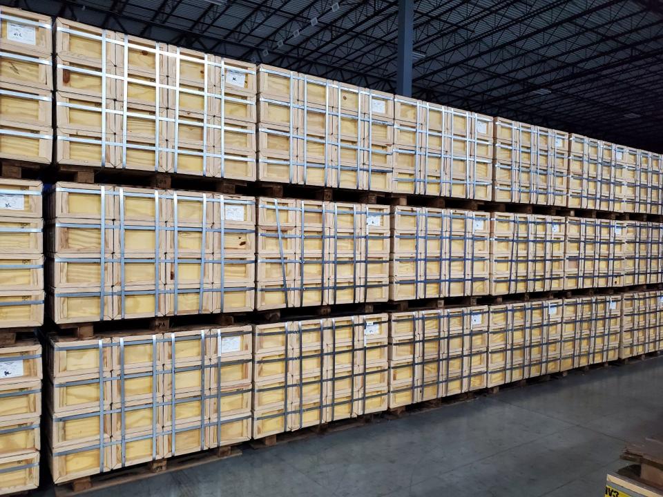 The .50-caliber ammunition was packed in plywood crates, waiting for a buyer.